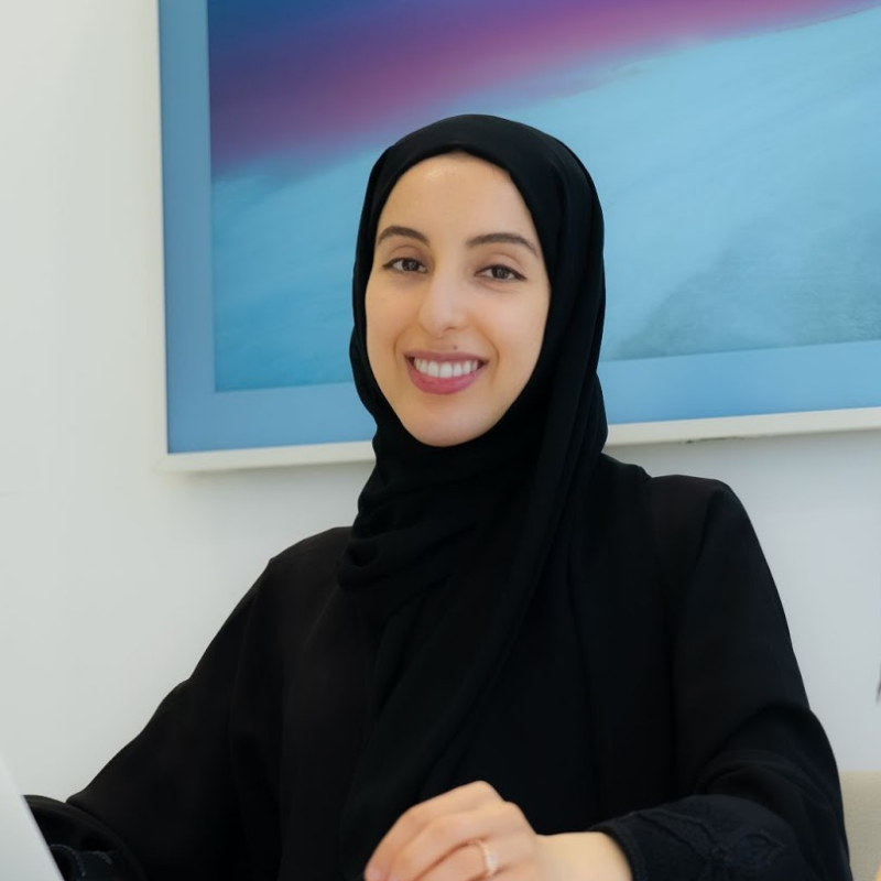 H.E. Shamma Al Mazrui at podium